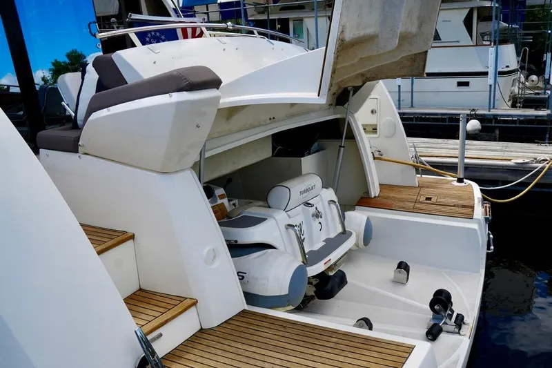 My Three Es Yacht Photos Pics 2016 Prestige 500 S yacht with open garage and Turbojet tender.