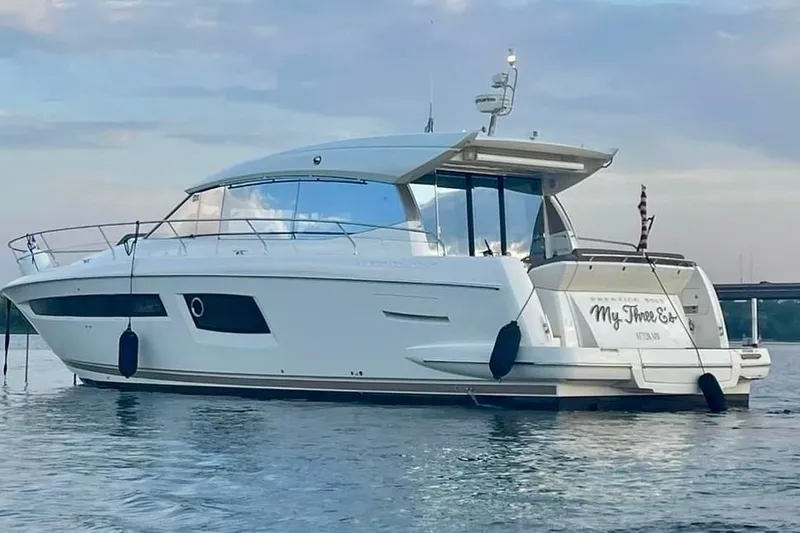 My Three Es Yacht Photos Pics 2016 Prestige 500 S yacht on calm water, showcasing sleek design and modern features.