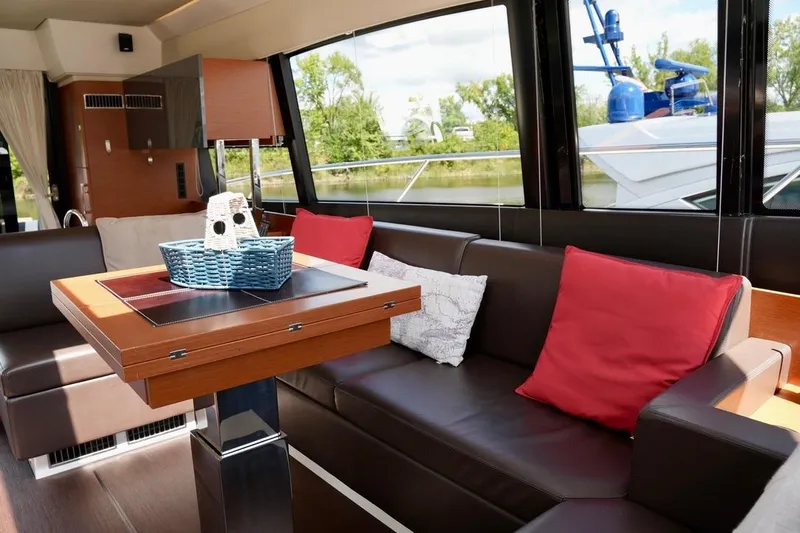 My Three Es Yacht Photos Pics Luxurious interior of 2016 Prestige 500 S yacht with elegant seating and decor.