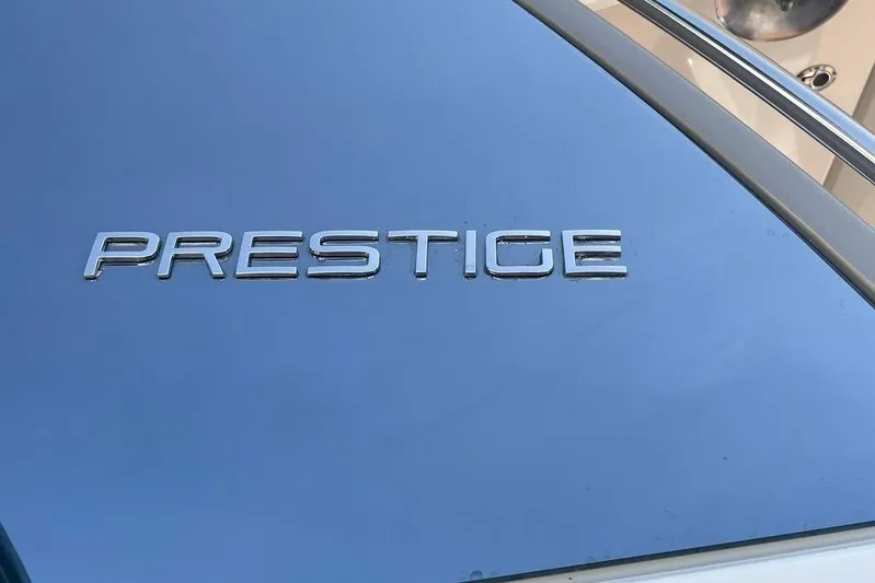 My Three Es Yacht Photos Pics Prestige 500 S 2016 model emblem on sleek metallic surface.