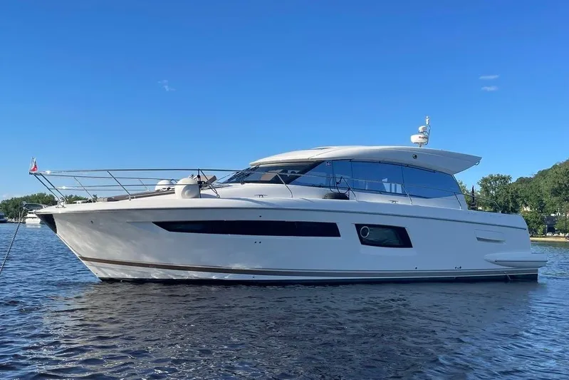 My Three Es Yacht Photos Pics 2016 Prestige 500 S yacht on calm water under clear blue sky.