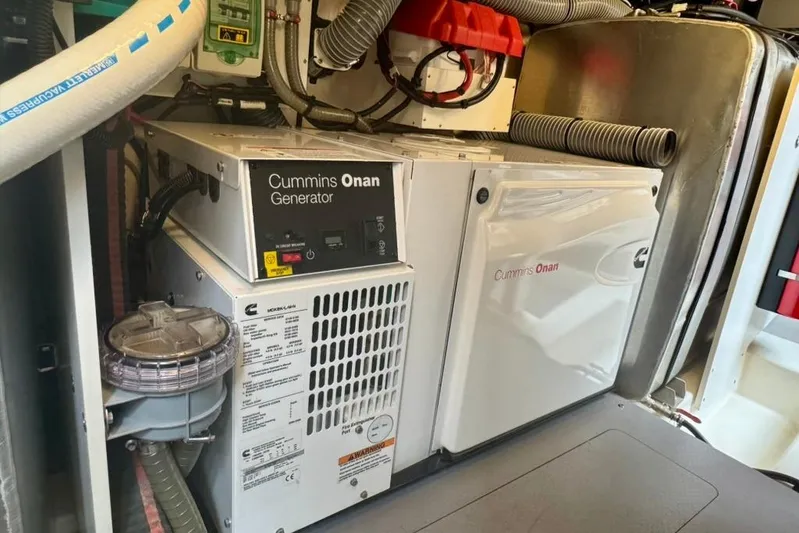 My Three Es Yacht Photos Pics Cummins Onan generator in 2016 Prestige 500 S yacht engine room.
