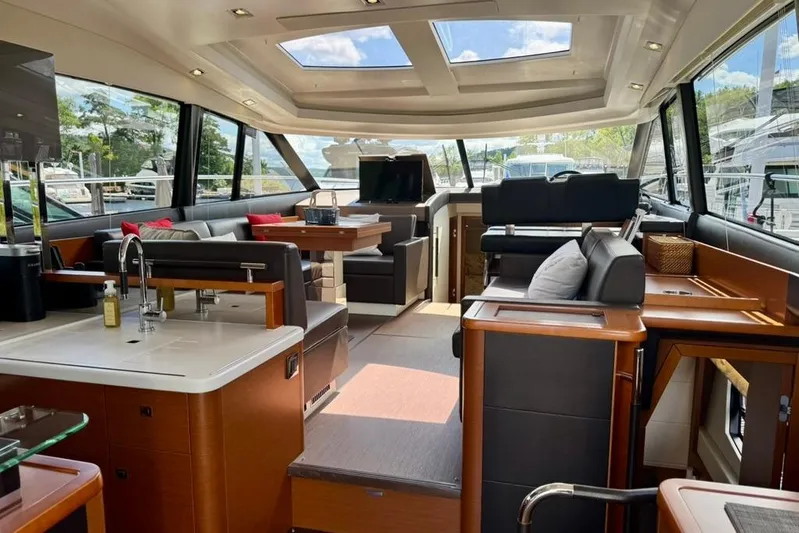 My Three Es Yacht Photos Pics Luxurious interior of a 2016 Prestige 500 S yacht with modern furnishings and ample natural light.