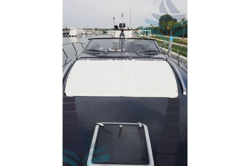  Yacht Photos Pics 2016 Riva 52 Rivale yacht docked, showcasing sleek design and luxurious features.