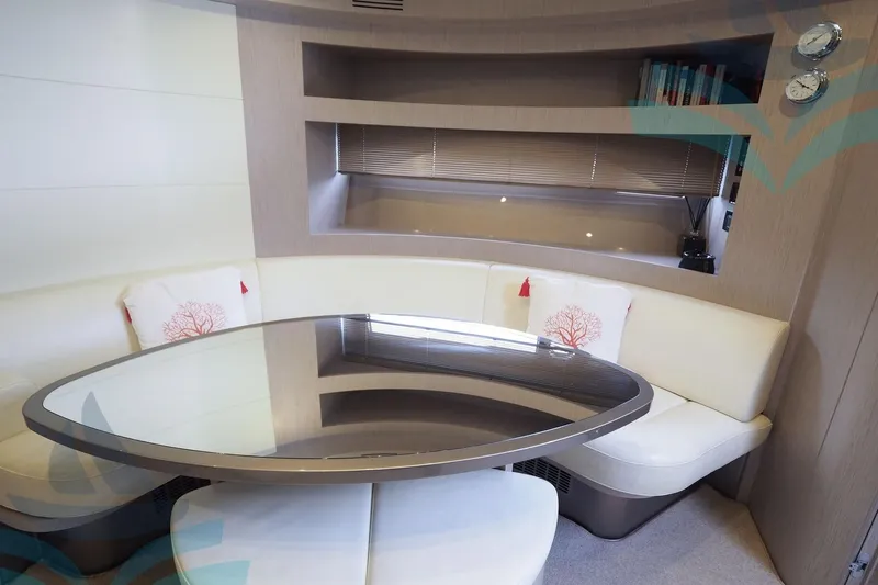  Yacht Photos Pics Luxurious interior of 2016 Riva 52 Rivale yacht with elegant seating and modern decor.