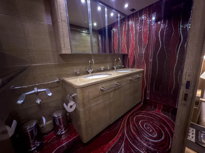 Ganache Yacht Photos Pics Luxurious yacht bathroom with elegant fixtures, red and brown decor, Leopard 24 model, 2005.
