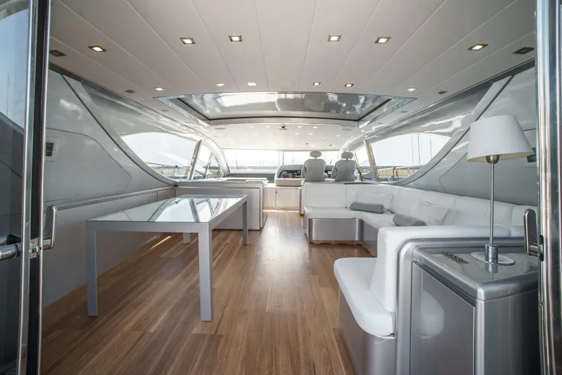Ganache Yacht Photos Pics Luxurious interior of a 2005 Leopard 24 yacht with modern furnishings and sleek design.