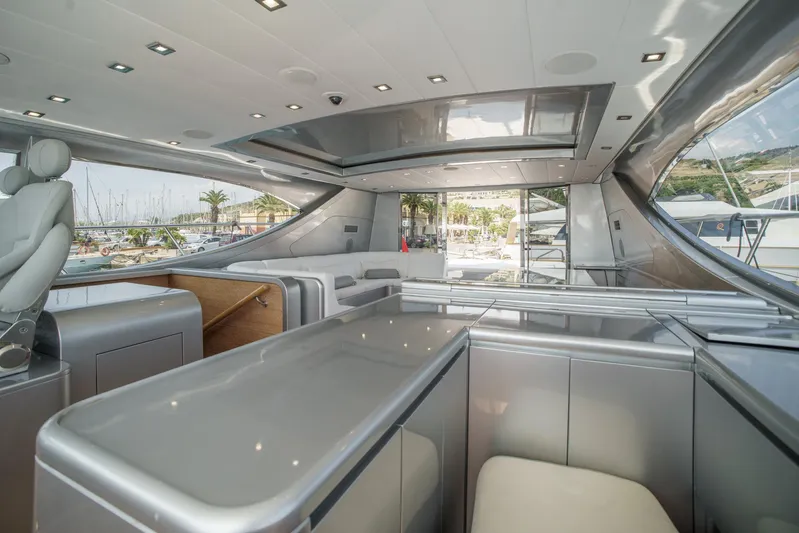 Ganache Yacht Photos Pics Luxurious interior of a 2005 Leopard 24 yacht with modern design and sleek finishes.