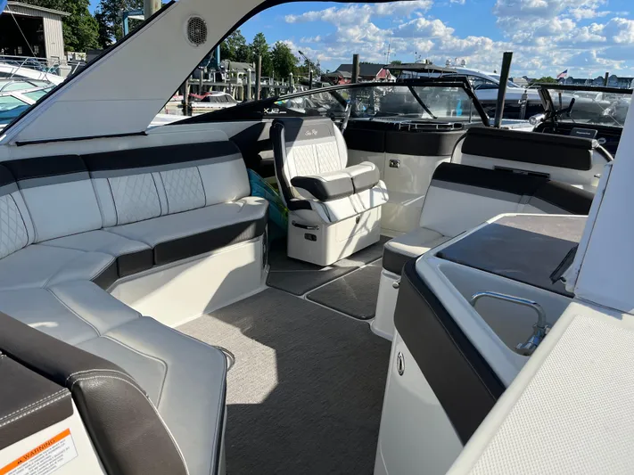  Yacht Photos Pics 2017 Sea Ray SLX 310 boat interior with luxurious seating and modern design.