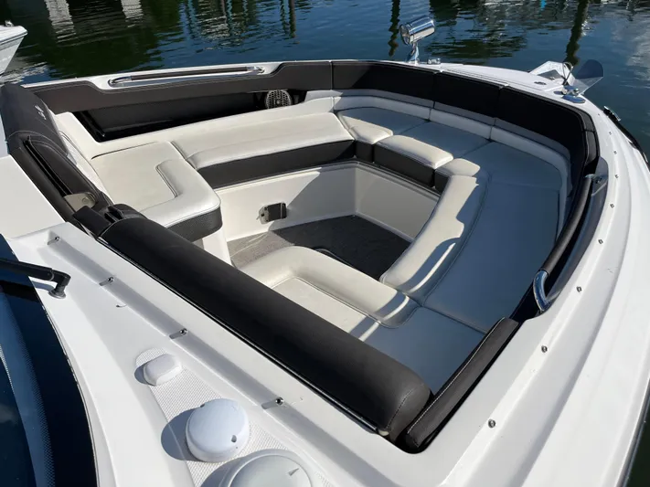  Yacht Photos Pics 2017 Sea Ray SLX 310 boat with spacious seating area and sleek design.