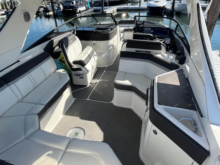  Yacht Photos Pics Luxurious 2017 Sea Ray SLX 310 boat interior with spacious seating and modern design.