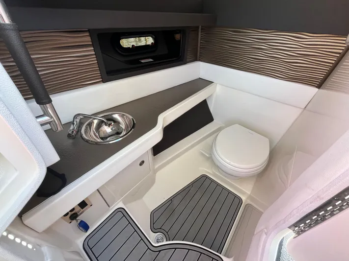  Yacht Photos Pics 2017 Sea Ray SLX 310 boat interior with sink and toilet, modern design.