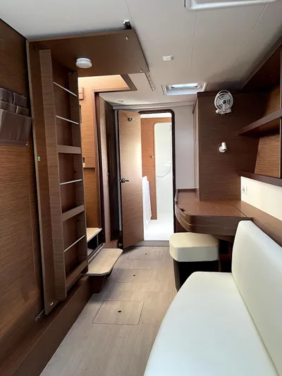 Ariella Yacht Photos Pics Interior of 2021 Lagoon 42 yacht with modern wood finish and white seating.