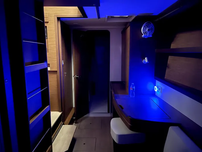 Ariella Yacht Photos Pics Interior of 2021 Lagoon 42 yacht with blue ambient lighting and modern furnishings.