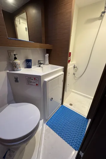 Ariella Yacht Photos Pics Modern bathroom in 2021 Lagoon 42 yacht with shower and toilet.