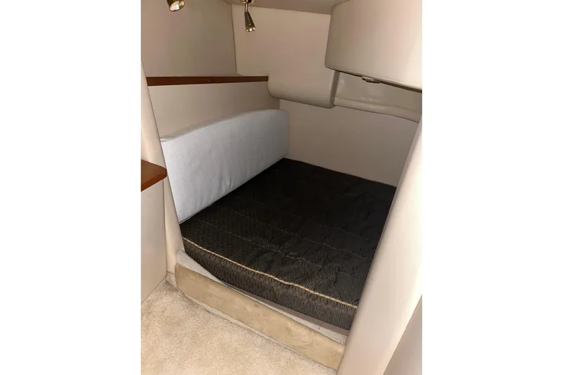  Yacht Photos Pics 2004 Meridian 341 Sedan cabin interior with cozy sleeping area.