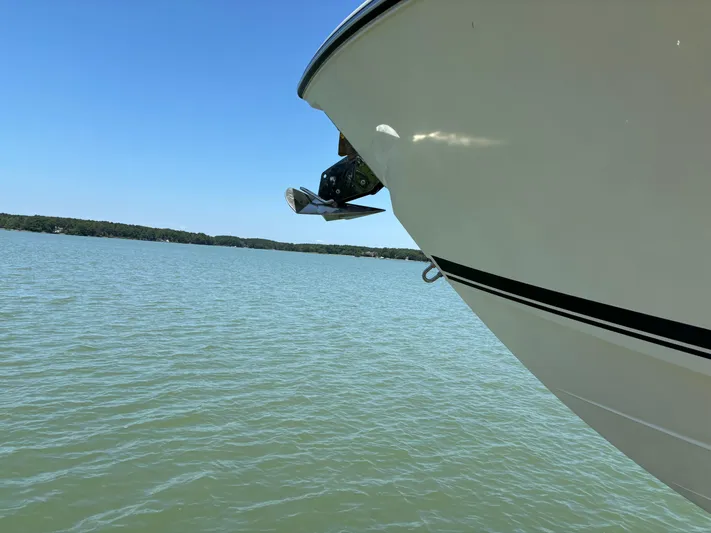  Yacht Photos Pics Bow of 2017 Pursuit DC 325 Dual Console on calm water.