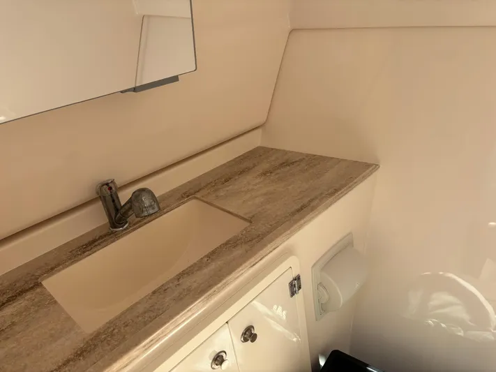  Yacht Photos Pics 2017 Pursuit DC 325 Dual Console interior with sink and countertop.