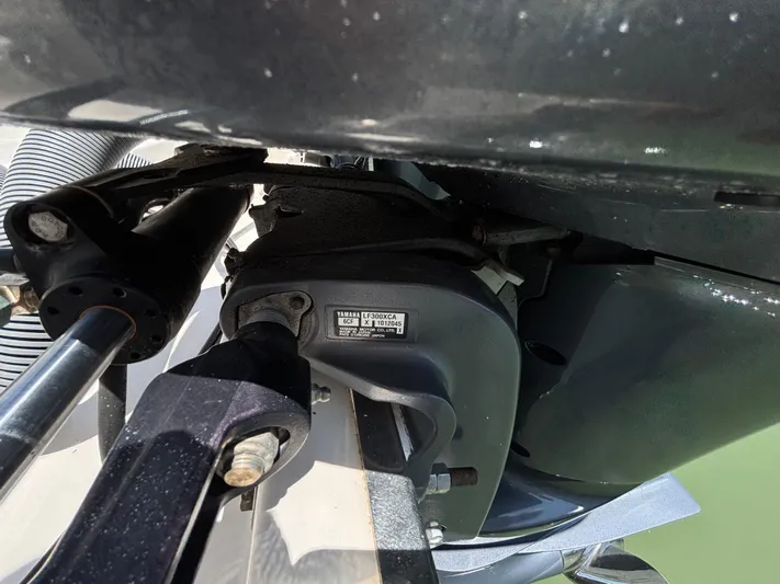  Yacht Photos Pics Close-up of a 2017 Pursuit DC 325 Dual Console boat engine component.