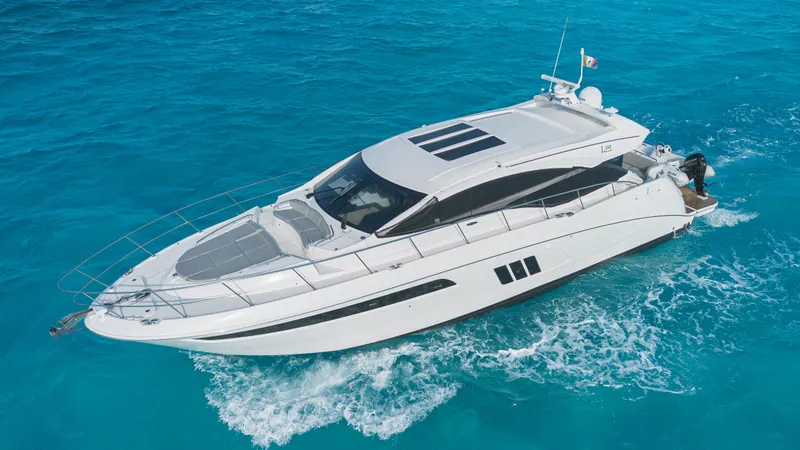 Wallys World Yacht Photos Pics 2017 Sea Ray L590 yacht cruising on clear blue ocean waters.