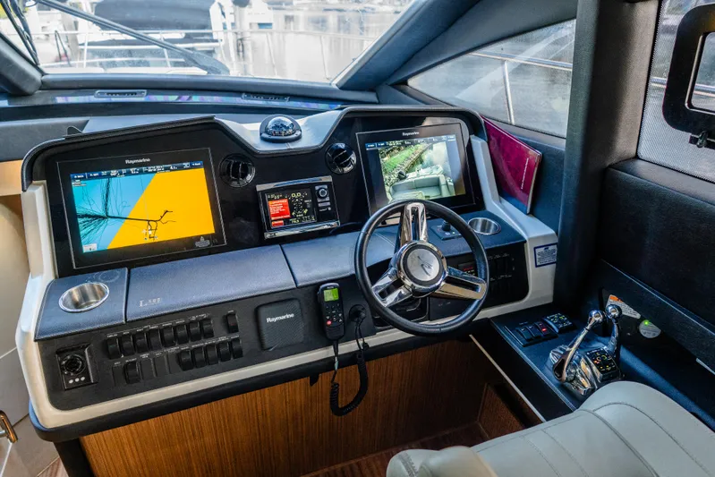 Wallys World Yacht Photos Pics 2017 Sea Ray L590 yacht helm with advanced navigation displays and controls.