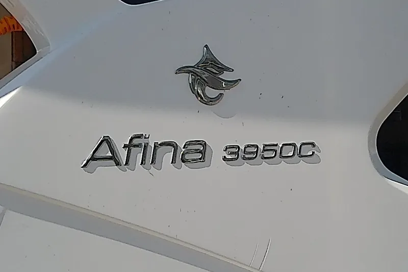  Yacht Photos Pics Floe Craft 3950C Aquafina 2019 model emblem on white surface.