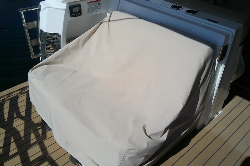  Yacht Photos Pics Covered seating area on 2019 Floe Craft 3950C Aquafina boat deck.