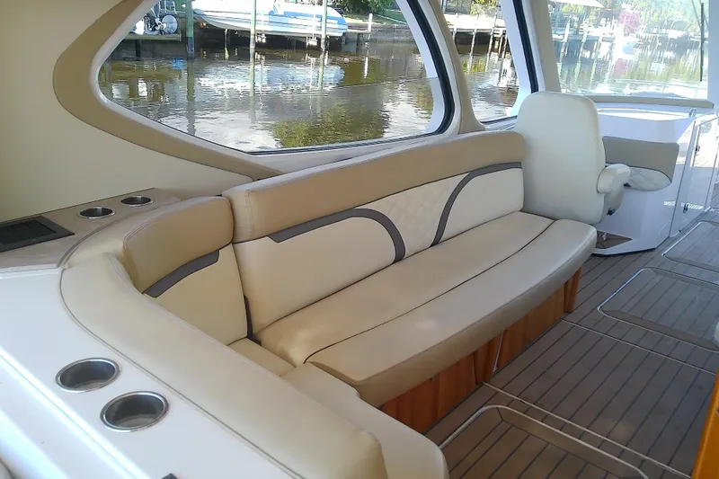  Yacht Photos Pics 2019 Floe Craft 3950C Aquafina boat interior with beige seating and wood accents.