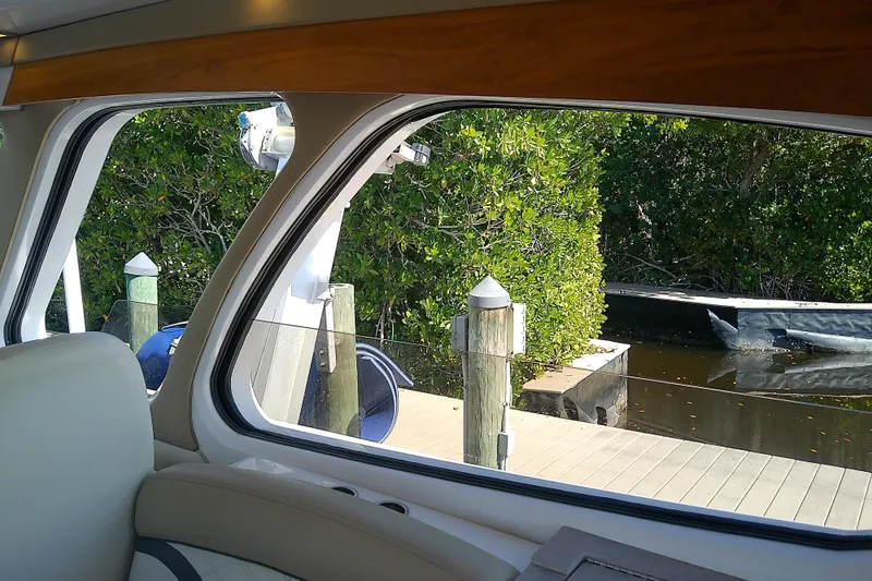  Yacht Photos Pics Interior view from 2019 Floe Craft 3950C Aquafina, overlooking dock and greenery.