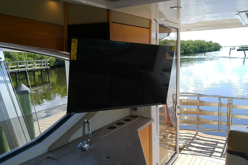  Yacht Photos Pics Interior of 2019 Floe Craft 3950C Aquafina yacht with TV and water view.