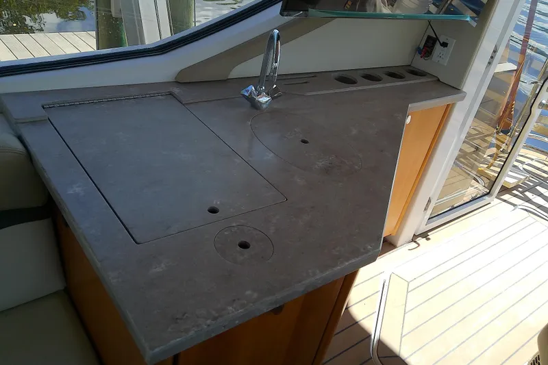  Yacht Photos Pics 2019 Floe Craft 3950C Aquafina boat interior with sleek countertop and modern faucet.
