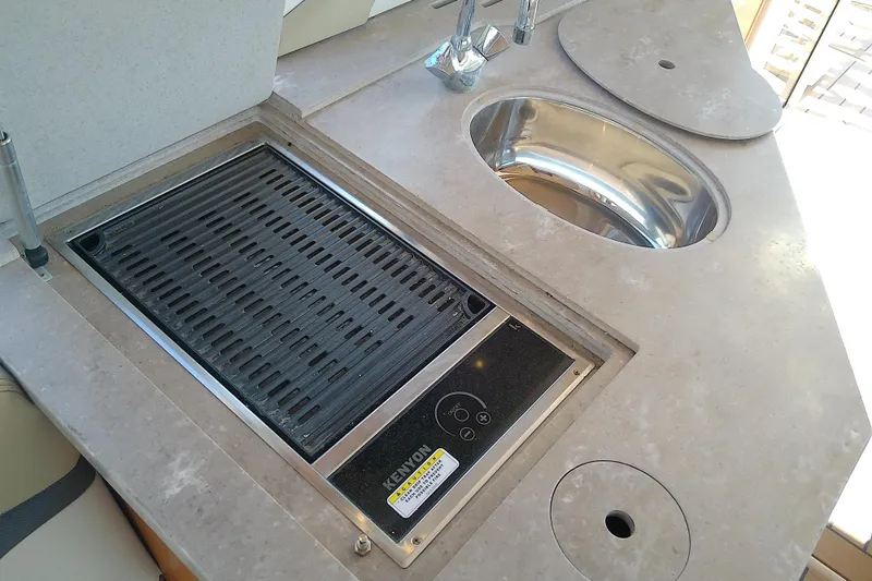  Yacht Photos Pics Outdoor kitchen on 2019 Floe Craft 3950C Aquafina with grill and sink.