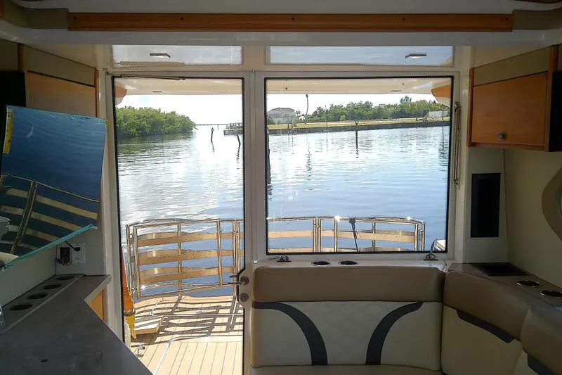  Yacht Photos Pics Interior view of 2019 Floe Craft 3950C Aquafina boat with scenic water backdrop.