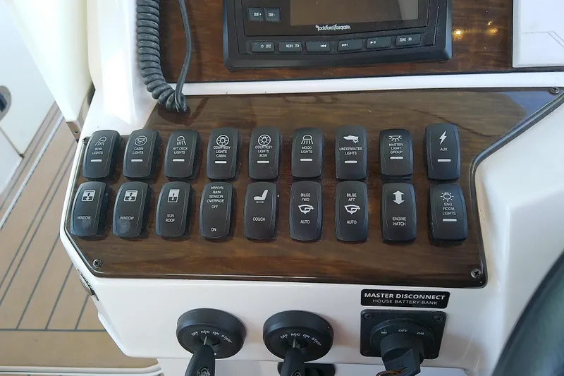  Yacht Photos Pics Control panel of 2019 Floe Craft 3950C Aquafina with various switches and buttons.