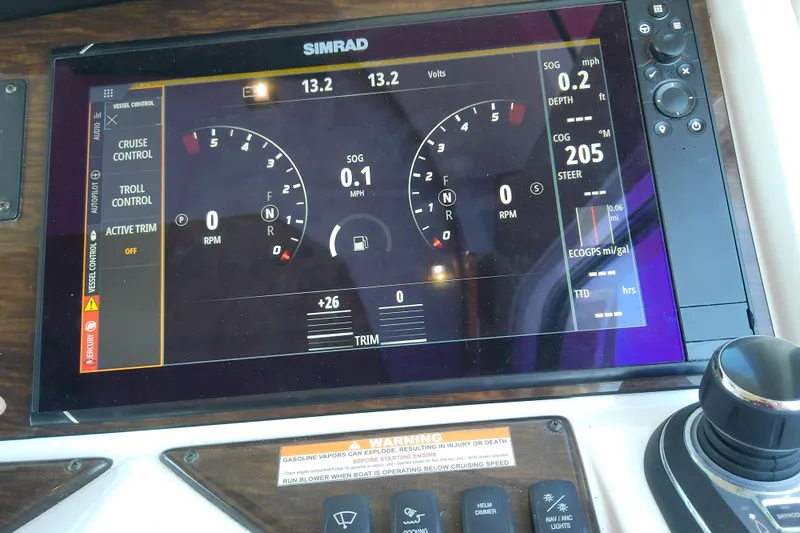 Yacht Photos Pics Simrad display on 2019 Floe Craft 3950C Aquafina boat dashboard, showing navigation and control settings.
