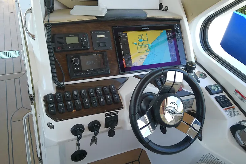  Yacht Photos Pics 2019 Floe Craft 3950C Aquafina boat dashboard with navigation system and controls.