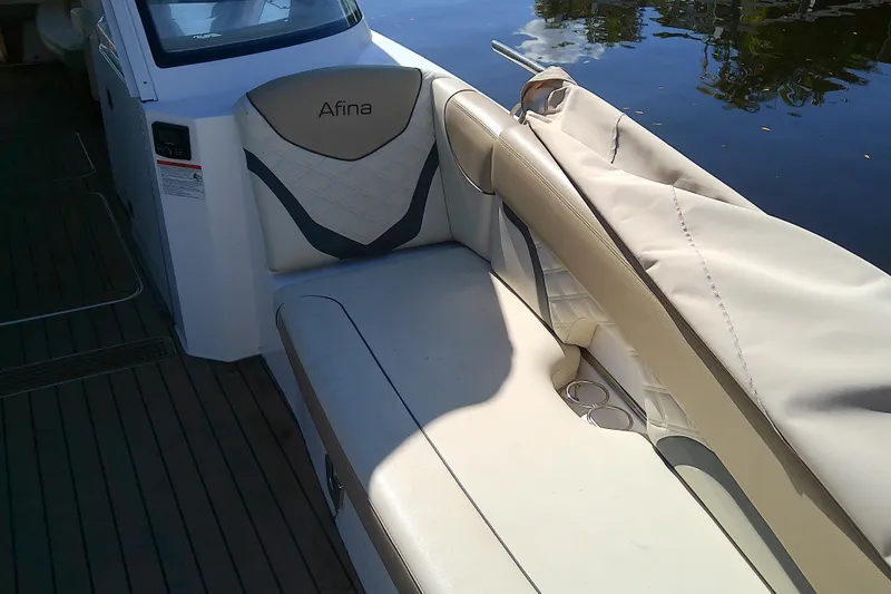  Yacht Photos Pics 2019 Floe Craft 3950C Aquafina boat interior with beige seating and water view.
