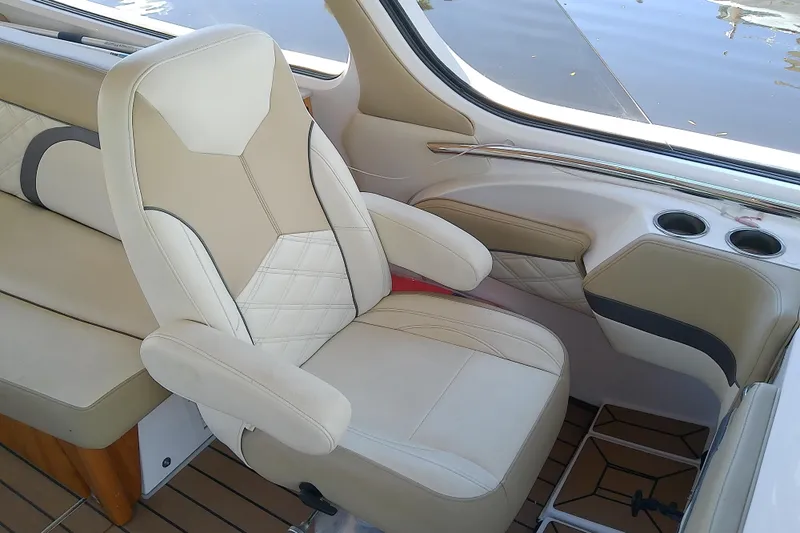  Yacht Photos Pics Luxurious interior of 2019 Floe Craft 3950C Aquafina boat with beige seating.