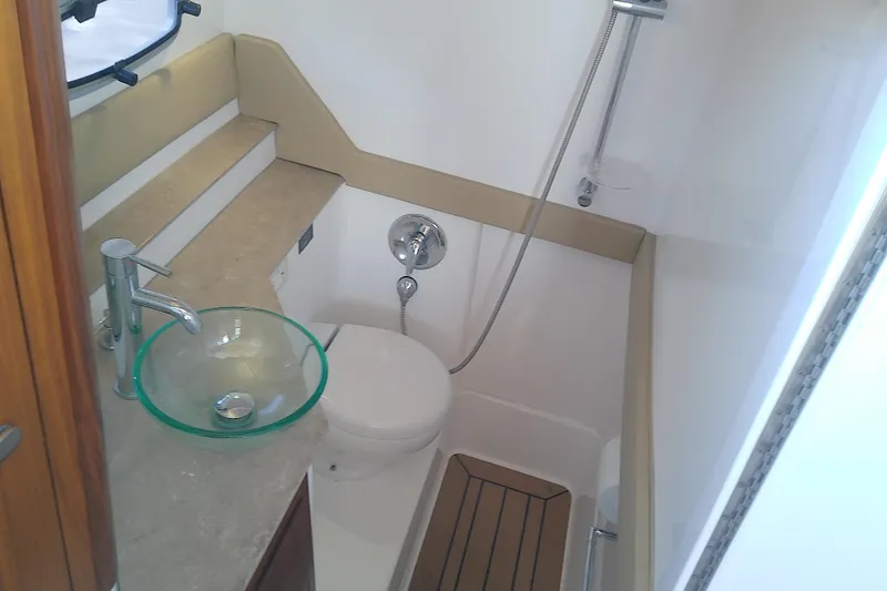  Yacht Photos Pics 2019 Floe Craft 3950C Aquafina boat bathroom with glass sink and shower.