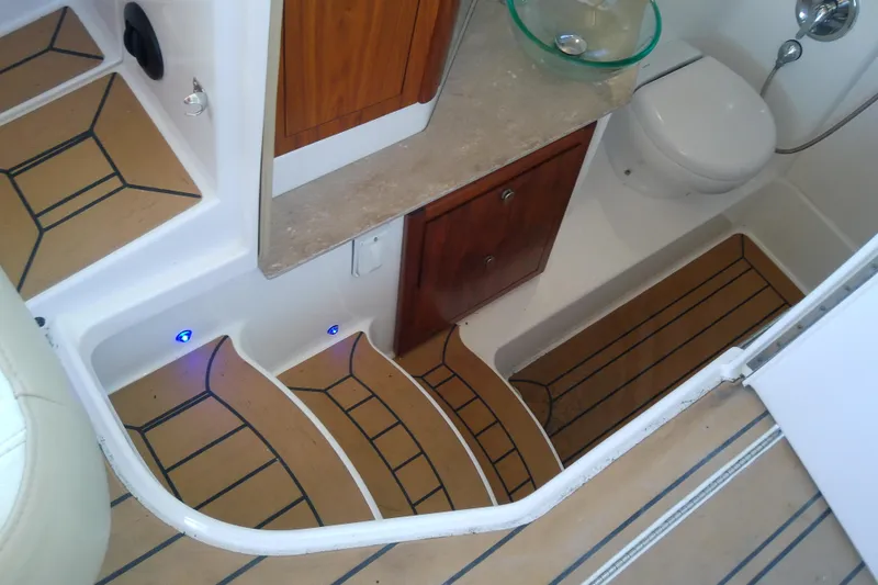  Yacht Photos Pics Interior of 2019 Floe Craft 3950C Aquafina boat with steps, cabinet, and toilet.