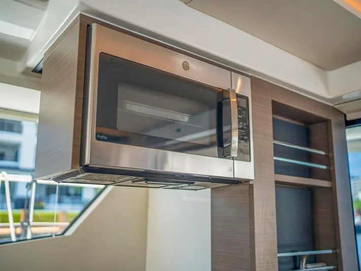 Breathe Yacht Photos Pics Modern kitchen microwave in 2020 Leopard 53 Powercat yacht interior.