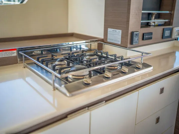 Breathe Yacht Photos Pics Modern kitchen stove on 2020 Leopard 53 Powercat yacht.