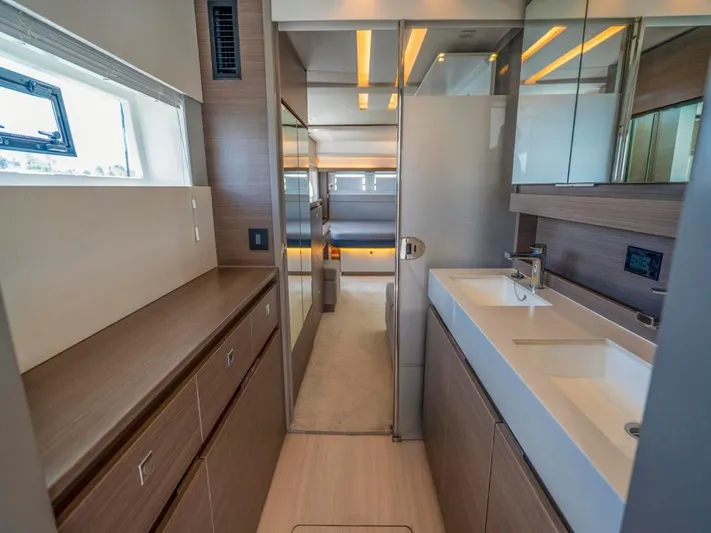 Breathe Yacht Photos Pics Modern bathroom interior of 2020 Leopard 53 Powercat yacht, featuring sleek design and dual sinks.