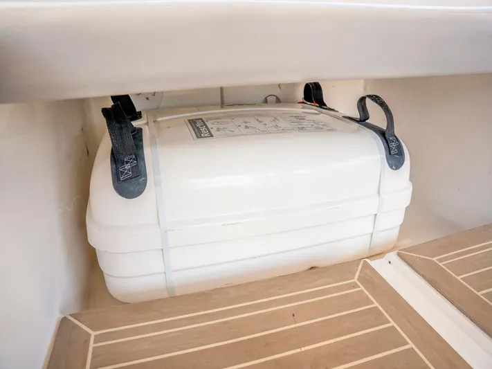 Breathe Yacht Photos Pics 2020 Leopard 53 Powercat safety equipment storage with secured white container.