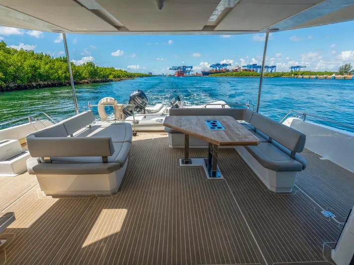 Breathe Yacht Photos Pics Luxurious 2020 Leopard 53 Powercat yacht with spacious deck and scenic waterway view.