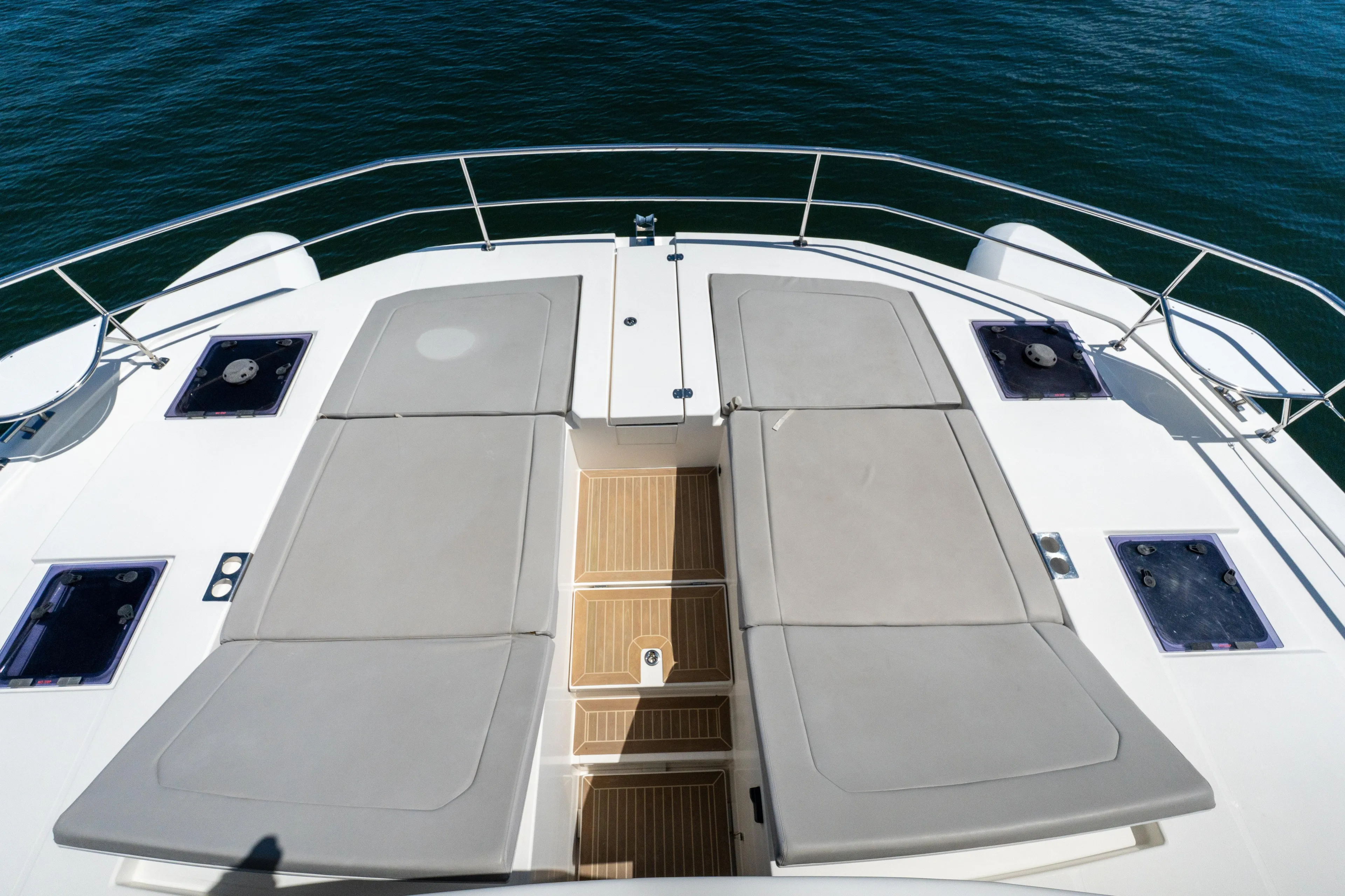 Breathe Yacht Photos Pics Leopard 53 Powercat 2020 yacht deck with sun loungers and ocean view.