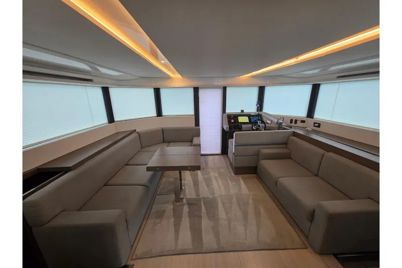 Breathe Yacht Photos Pics Luxurious interior of 2020 Leopard 53 Powercat with modern seating and navigation area.