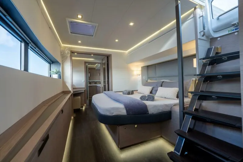 Roamance Yacht Photos Pics Luxurious interior of 2022 Fountaine Pajot Alegria 67 yacht with modern bedroom design.