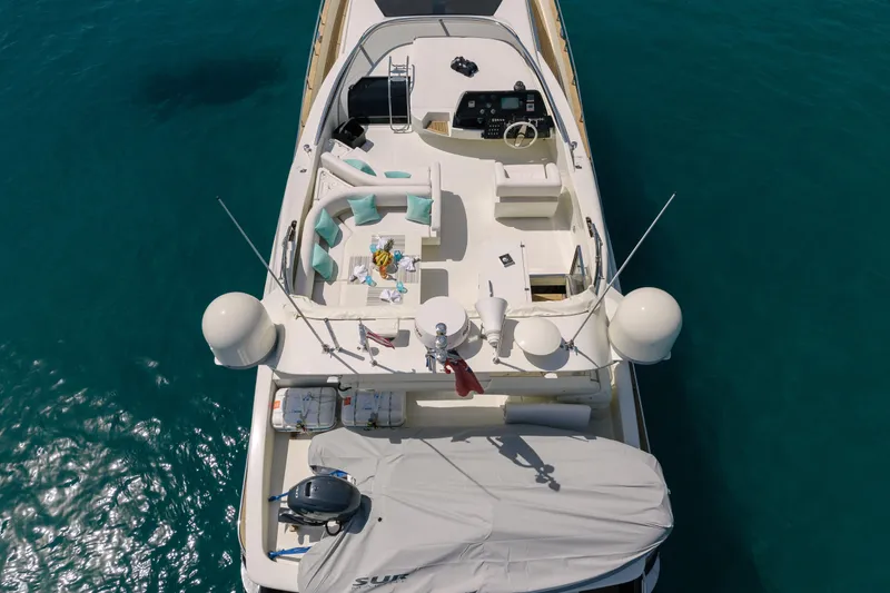 Milky Way Yacht Photos Pics Aerial view of 2007 Riva Venere 75 yacht on clear blue water.