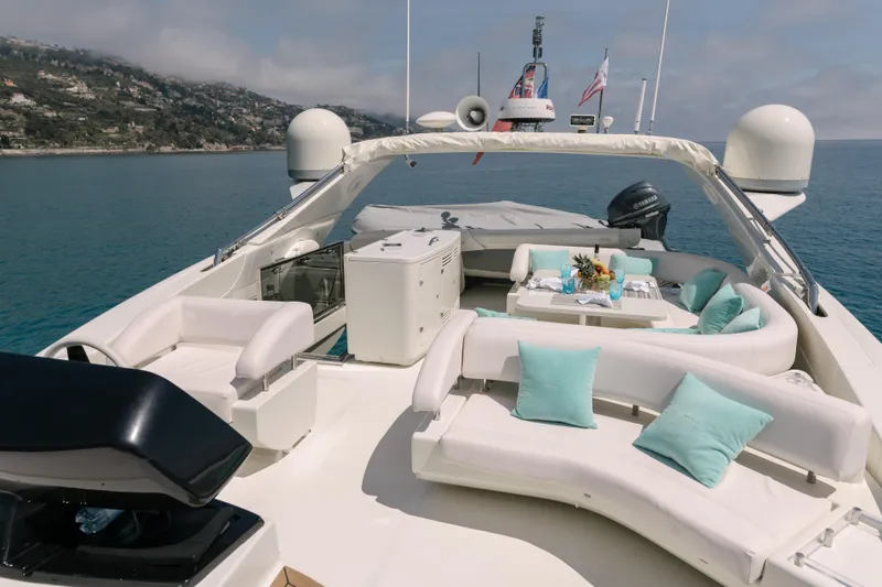 Milky Way Yacht Photos Pics Luxurious 2007 Riva Venere 75 yacht deck with elegant seating and ocean view.